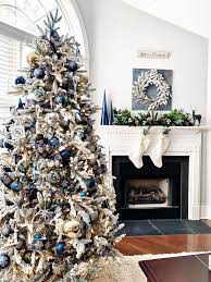 Even though i've decorated my dining room each season, this is our first tree since we repainted the room! Blue And Silver Christmas Tree For The Living Room 2 Bees In A Pod Blue Christmas Decor Blue Christmas Tree Decorations Elegant Christmas Trees