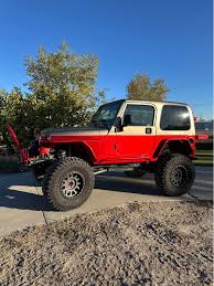 Image result for Flame Red 2005 Jeep