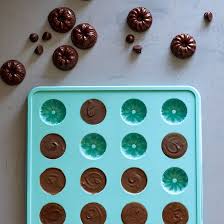 Never deal with candies sticking to your silicone chocolate mold again. Chocolate And Candies Using The Fluted Chocolate Mold Chocolate Molds Recipe Chocolate Molds Pampered Chef