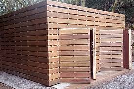 Carport with pine siding under and cedar trim. Bespoke Wooden Garage Manufacturer In Uk Custom Timber Garage