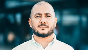 FIU-ARCH T-Talks[23] with Cenk Atun. ————————— Cenk Atun was born in 1975  in Nicosia, Cyprus. After completing his primary, secondary, and high  school education, he began studying architecture at Eastern Mediterranean  University (