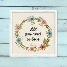 This dmc floral wreath embroidery pattern will create a lovely design, perfect for any hooped wall hanging, denim jacket or tote bag decoration. Floral Wreath Cross Stitch Patterns