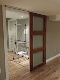 Pin By Samantha Rapp On Barndoors Barn Door Closet Hanging Barn Doors Interior Barn Doors
