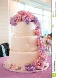 Wedding Cake With Pink And Purple Flowers Pink Rose Wedding Cake Pink Wedding Cake Wedding Cake Roses