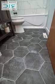 If you opt for medium or dark gray wall and floor tiles, try selecting tiles of different sizes, shapes and shades to keep them from looking monolithic and overbearing. Bathroom Designs Tile Ideal