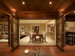 The base of this track is flush with the ceiling, allowing the doors to pass from floor to ceiling. Bifold And Stacker Doors M B Building Products