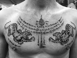 Muay Thai Tattoo Symbols And Meanings Muay Thai Tattoo Buddhist Tattoo Tibetan Tattoo