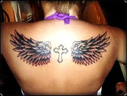Grey angel wings tattoo on man chest. 115 Inventive Wings Tattoos And Designs For Men Women