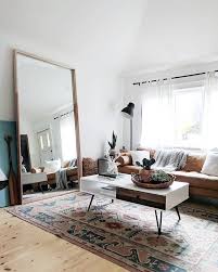 And Just Like That We Have Our Very Large Diy Mirror Frame Safe And Sound Nestled In Our Living Minimalist Living Room Living Room Mirrors Living Room Designs