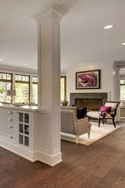 The Key For Designing A Great Space And Dealing With Support Columns Is To Place Something Right Next Interior Columns Livingroom Layout Beautiful Living Rooms