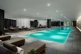 Our expert designers can customize a pool home plan to meet your needs. Wellness The Middle House