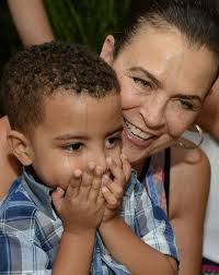 Jamaica GleanerGallery|Mother's Day Brunch|Rudolph Brown/Photographer Cindy  Breakspeare, plays with her grandson Grandson Joshua at the Boone Hall  Oasis Mother Day brunch in Stony Hill