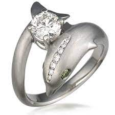 Dolphin Engagement Ring This Sculptural Engagement Ring Shows A Dolphin Elegantly Supporting A Center Diamond Engagement Rings Dolphin Ring Dolphin Jewelry