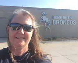 STANDING WITH COLTON