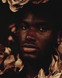 Ay, Woah, you made me this way, yeah…Before I'm gone outta this place,  yeah… Put some flowers in my face...”