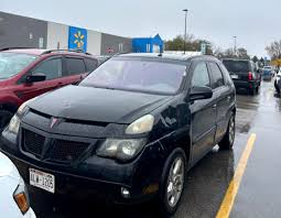 Image result for Dark Meander Green 2004 Pontiac