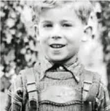 Anyone one know who this boy is? Bet you know his daddy.