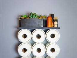 Button threw oven handle and place towel threw the hoop. Upcycle Pvc Pipe Into Budget Friendly Bathroom Storage Hgtv