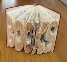 This Secondhand Store Volunteer S Book Folding Art Will Blow Your Mind Cube Breaker Folded Book Art Book Art Book Folding