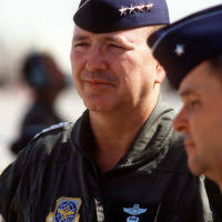 U.S. military personnel welcome GEN. Hansford T. Johnson, U.S.  commander-in-chief, Transportation Command and commander-in-chief, Military  Airlift Command, upon his arrival during Operation Desert Shield