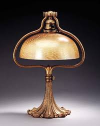 A Favrile Glass And Gilt Bronze Table Lamp Tiffany Studios Circa 1910 17 In 44 4cm High 10in 25 4cm Diameter Of The Shade The Gold Murano Galeri