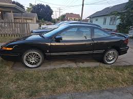 Image result for Black Gold 1995 Saturn