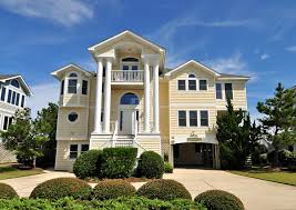 Guests of this vacation home enjoy features like a fitness center, a spa tub, and an arcade/game room. Amazing View Vacation Rental Twiddy Company