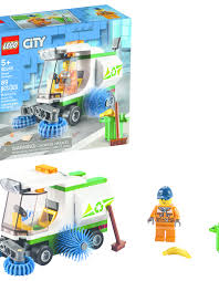 Iconic vehicles and buildings form the bustling backdrop. 60249 Lego City Great Vehicles Street Sweeper Jack Gray Kids