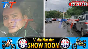 Largas filas de vehículos en surtidores para cargar combustible.