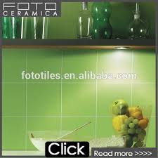 Modern kitchen wall tiles designs are a natural choice because they are low maintenance these subtle copper wall tiles for the kitchen have a timeless, subtle look, which elevates the the greenery and fruit bowl offer the required pop of colour to the clean lines of the small kitchen wall tiles. Modern Kitchen Design Foshan Ceramic Tile Dark Green Color 20x20cm Buy Ceramic Tile Dark Green Kitchen Tiles Kitchen Ceramic Tiles Product On Alibaba Com