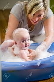 Here you may to know how to bathe 7 month old baby. Happy Mother Bathing Her Cute 7 Month Old Baby Stock Photo Picture And Royalty Free Image Image 6610608