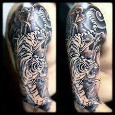 The glowing hyper real half sleeve tiger tattoo featured in the natural habitat reminds an oil painting and signifies good luck prosperity and productivity. 37 Tiger Tattoo Sleeve Ideas Tiger Tattoo Sleeve Tiger Tattoo Sleeve Tattoos