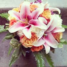 Maybe you would like to learn more about one of these? Pink Stargazer Lilies Coral Bicolor Roses Orange Rose Sprays And White Hydrangea Wi Orange Rose Bouquet Stargazer Lily Wedding Stargazer Lily Wedding Bouquet