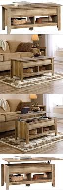 This coffee table features two lift tops, perfect for multiple members in the family, and a great fit for 45 Rustic Coffee Tables And Diy Plans Rustic Home Decor And Design Ideas