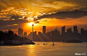 Sydney City The Setting Sun Drops Behind The City Skyline And Sprays Light In All Directions Bathing The City Sydney Beaches Sydney Skyline Travel Pictures