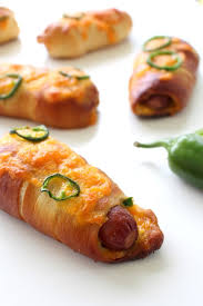 Pat the hotdogs dry and twist the pretzel dough around the hotdogs. Jalapeno Popper Pretzel Dogs Chocolate With Grace
