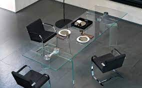 Buy second hand fiam italia rectangular glass dining table in gently used condition with 75% off on kaiyo. Modern Curved Glass Tables Fiam Italia