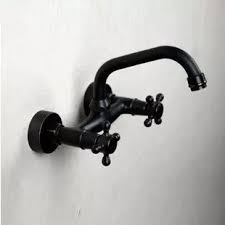 These faucets are available in various finishes, styles and handle option and create a clean modern look in your bathroom. Antique Black Brass Bronze Wall Mounted Mixer Bathroom Sink Tap Tb109w Tb109w 109 99 Uktaps Co Uk Taps Uk Online Store