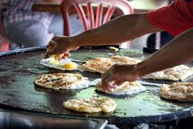Super crispy roti canai roti prata malaysia street food taman sri tebrau hc. Welovetoeat Roti Canai Kayu Arang Melaka Memang Tsunami