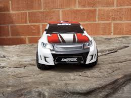 Anyone did this before ? Putting Prerunner wheel and tires in Rally chassis  ? I really like the look, but so far has 2 problems: 1. Front tires  touching chassis when turning,