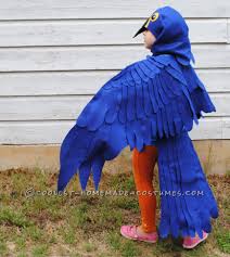 Homemade Bird Costume For Kids This Is A Blue Macaw Parrot Costume Handmade By Me A Stay At Home Mom And Freelance Artist This Cos Parrot Costume Animal Costumes Animal Halloween Costumes