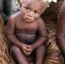 Non-caucasian people with natural blonde hair