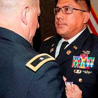 U.S. Ambassador in Poland, Georgette Mosbacher, shakes