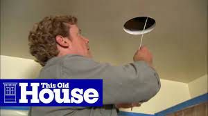 Kevin and our electrician, heath eastman, install modern led downlights in the kitchen. All About Lights How To Install Recessed Lights This Old House Youtube