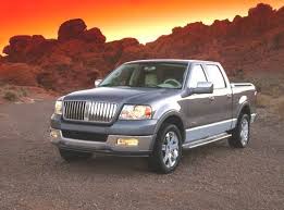 Image result for Dark Toreador Red 2006 Lincoln