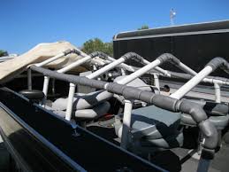 Our diy pontoon boat cover support uses two cheap patio umbrellas. Homemade Boat Cover Support Idea Catfish Angler Forum At Usca