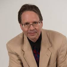 Eric Olsen (Piano, Organ, Choral Conductor)