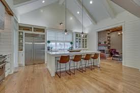 Adding shiplap to a kitchen island is an easy and affordable way to add character to your kitchen. Shiplap Kitchen With Eat In Island And Vaulted Ceiling Hgtv