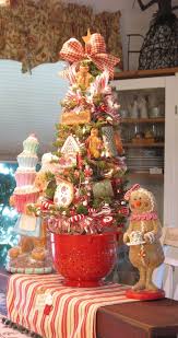 Red and white decorations with a touch of silver and green create a perfect atmosphere for your party. 30 Creative Gingerbread Christmas Decoration Ideas Gingerbread Christmas Decor Christmas Tree Themes Gingerbread Christmas Tree