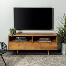 Avec Des Pieds Legerement Effiles Ce Meuble Tele Est Dote D Une Silhouette De Style Mid Century Moderne Pour Complete Solid Wood Tv Stand Modern Tv Stand Home